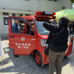 ⑨消防コーナーでの我が子の勇姿にお母さんもご満悦！