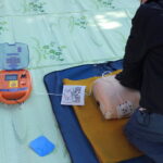 ④応急手当（胸部圧迫とAED）訓練