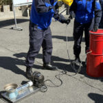 ⑨バーナーの組立見学。風が強くて火がつかない。何れにしても素人には難しそう